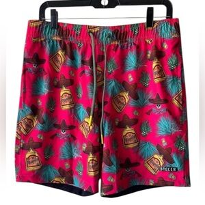 Vibrant Blue and Pink Board Shorts for Beach Adventures